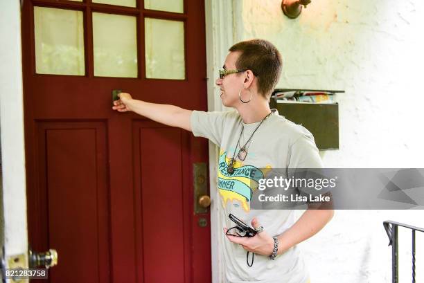 MoveOn.org member goes door to door during the Neighborhood Listening Project Healthcare Door Knocking Canvass Event on July 23, 2017 in Ardmore,...