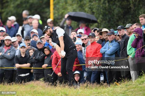 Dustin Johnson of the United States hits from the rough during the final round of the 146th Open Championship at Royal Birkdale on July 23, 2017 in...