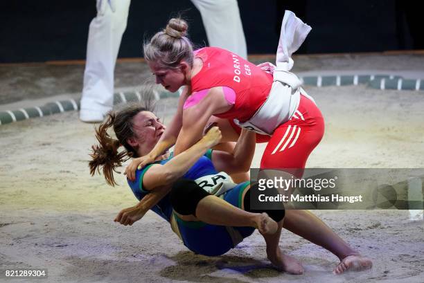 Julia Dorny of Germany competes against Luciana Montogomery Higuchi of Brazil during the Sumo Open Weight Women's Competition of The World Games at...