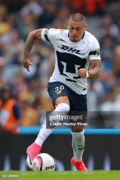 Nicolas Castillo of Pumas drives the ball during the 1st round match between Pumas UNAM and Pachuca as part of the Torneo Apertura 2017 Liga MX at...