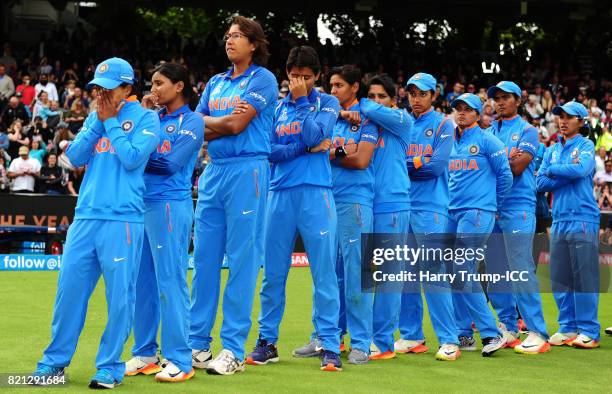 The India side cut dejected figures during the ICC Women's World Cup 2017 Final between England and India at Lord's Cricket Ground on July 23, 2017...