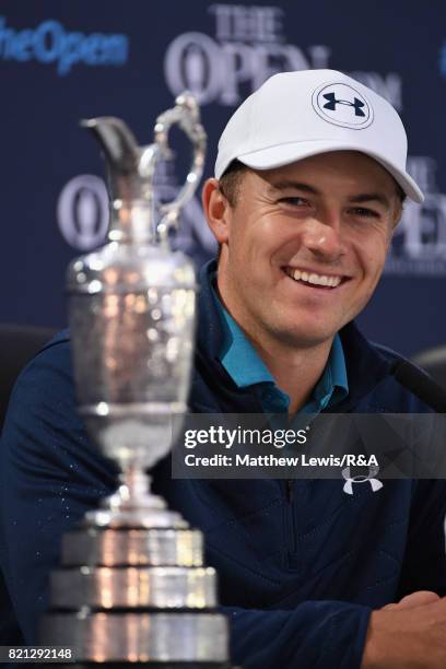 Jordan Spieth of the United States sits with the Claret Jug and speaks to the media at a press conference after victory during the final round of the...