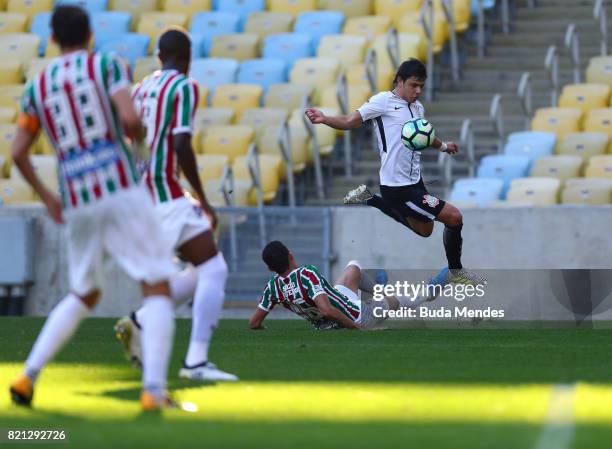 Renato Junior of Fluminense struggles for the ball with Angel Romero of Corinthians during a match between Fluminense and Corinthians as part of...