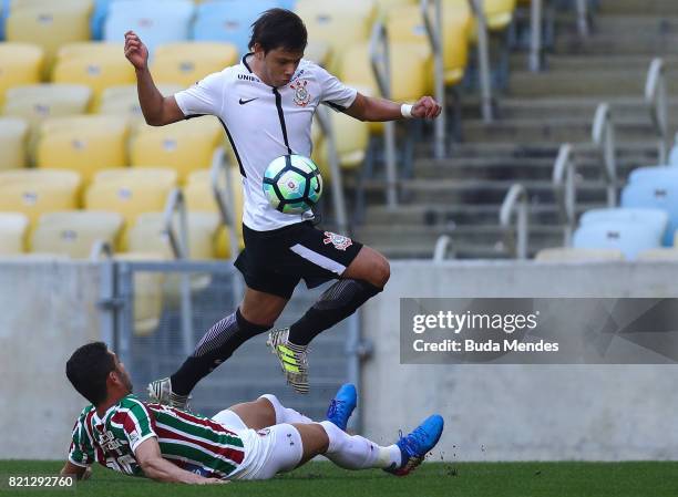 Renato Junior of Fluminense struggles for the ball with Angel Romero of Corinthians during a match between Fluminense and Corinthians as part of...