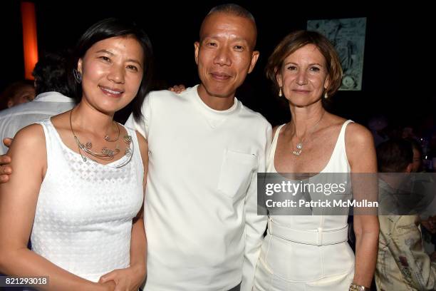 Hong Hong Wu, Cai Guo-Qiang and Toni Ross attend Boom! The Cosmic LongHouse Benefit at LongHouse Reserve on July 22, 2017 in East Hampton, New York.