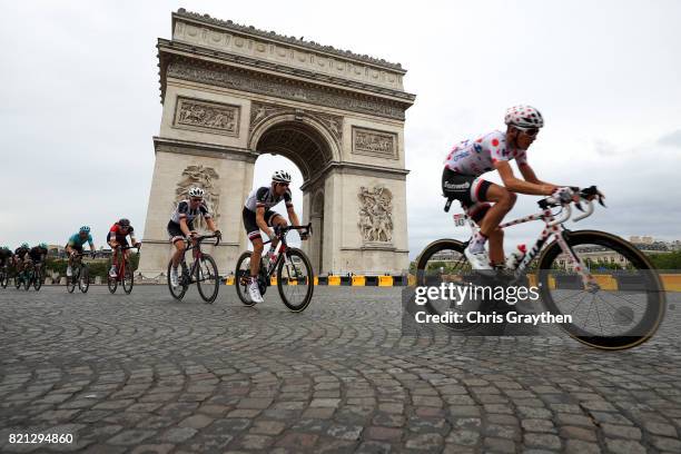 Warren Barguil of France riding for Team Sunweb in the king of the mountains jersey rides past the Arc de Triomphe during stage 21 of the 2017 Le...