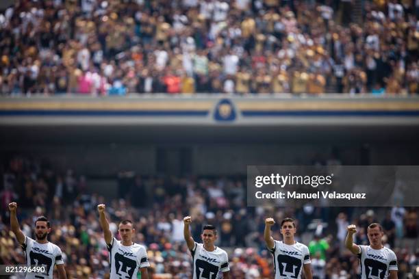 Luis Quintana, Brian Figueroa, Nestor Calderon, Jose Carlos Van Rankin, Abraham Gonzalez of Pumas wave at the fans prior the 1st round match between...