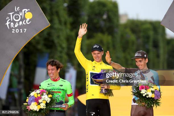 Second place Rigoberto Uran of Colombia riding for Cannondale Drapac, overall winner Christopher Froome of Great Britain riding for Team Sky and...