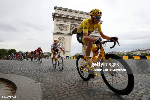 Christopher Froome of Great Britain riding for Team Sky in the leader's jersey rides past the Arc de Triomphe during stage 21 of the 2017 Le Tour de...