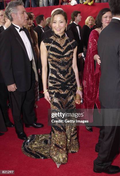 Actress Michelle Yeoh arrive for the 73rd Annual Academy Awards March 25, 2001 at the Shrine Auditorium in Los Angeles. Yeoh is wearing a dress by...