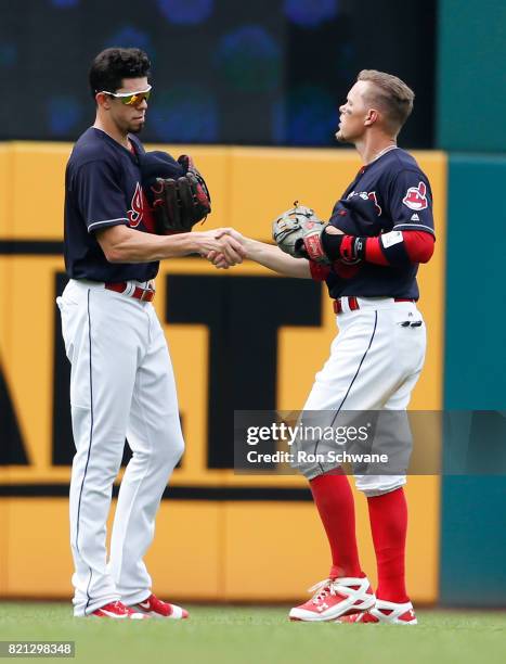 Bradley Zimmer and Brandon Guyer of the Cleveland Indians celebrate an 8-1 victory over the Toronto Blue Jays at Progressive Field on July 23, 2017...