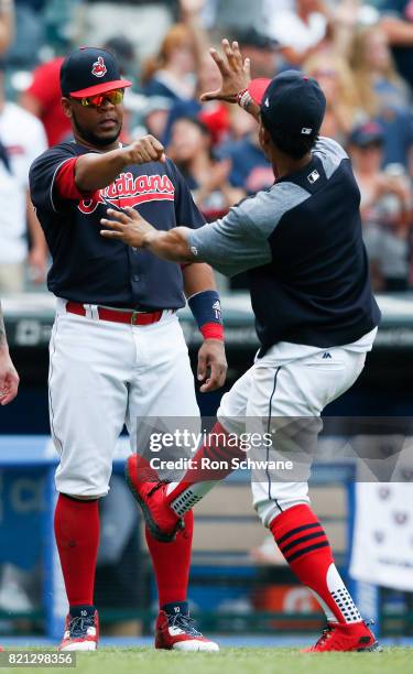 Edwin Encarnacion and Francisco Lindor of the Cleveland Indians celebrate an 8-1 victory over the Toronto Blue Jays at Progressive Field on July 23,...