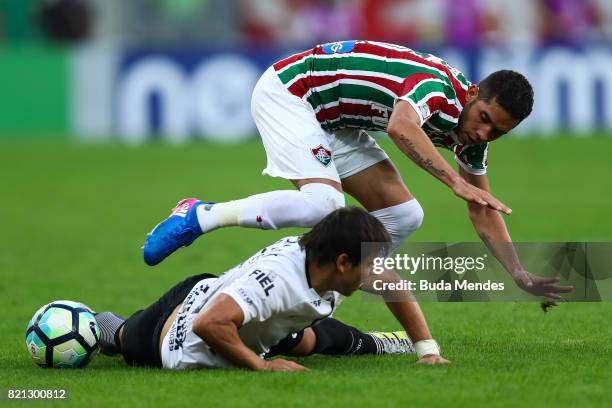 Renato Junior of Fluminense struggles for the ball with Angel Romero of Corinthians during a match between Fluminense and Corinthians as part of...