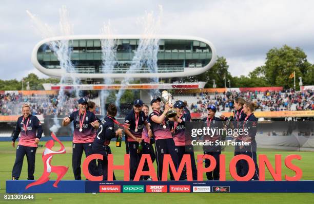 England celebrate with the trophy after the ICC Women's World Cup 2017 Final between England and India at Lord's Cricket Ground on July 23, 2017 in...