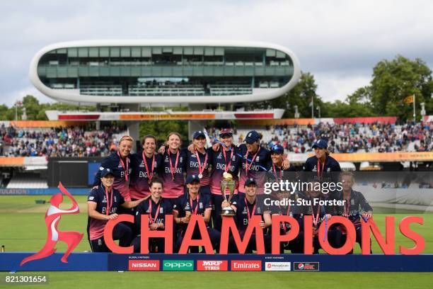 England celebrate with the trophy after the ICC Women's World Cup 2017 Final between England and India at Lord's Cricket Ground on July 23, 2017 in...