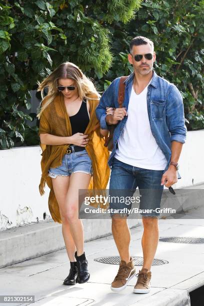 LeAnn Rimes and Eddie Cibrian are seen at LAX on July 23, 2017 in Los Angeles, California.