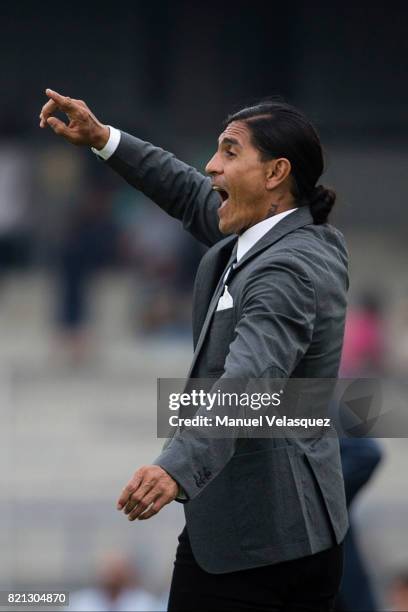 Juan Francisco Palencia coach of Pumas gives instructions to his players during the 1st round match between Pumas UNAM and Pachuca as part of the...