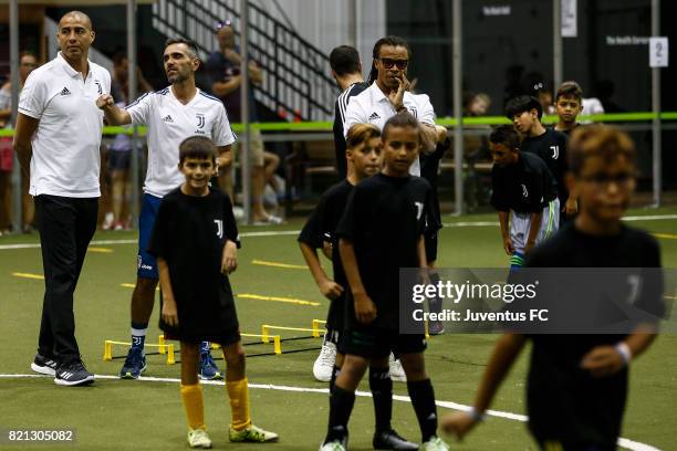 Juventus legends Edgar Davids and David Trezeguet watch youth training at the Juventus Academy USA launch event on July 23, 2017 in Sparta, New...