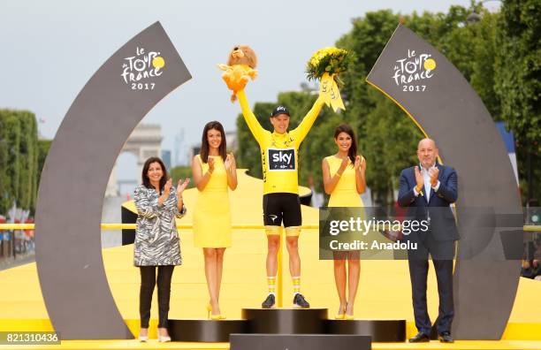 Team Sky rider Christopher Froome of Great Britain celebrates on the podium after winning the Tour de France 2017 cycling race at the Avenue des...