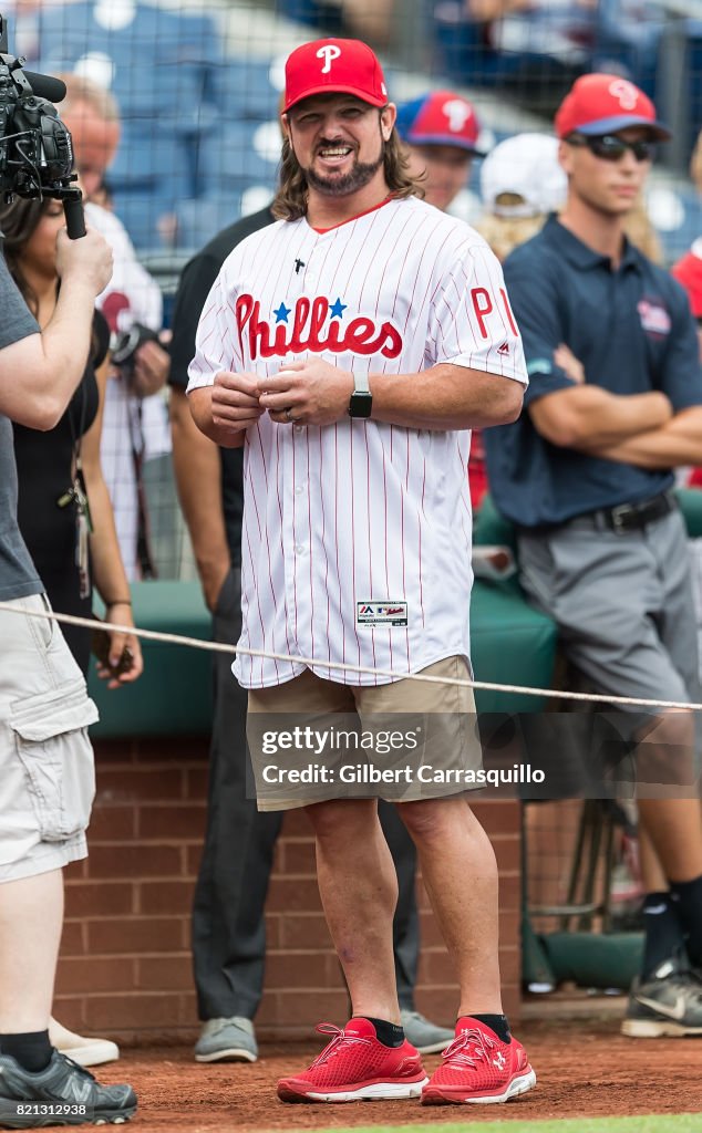 AJ Styles Throws Out The First Pitch At The Milwaukee Brewers Vs Philadelphia Phillies Game - July 23, 2017