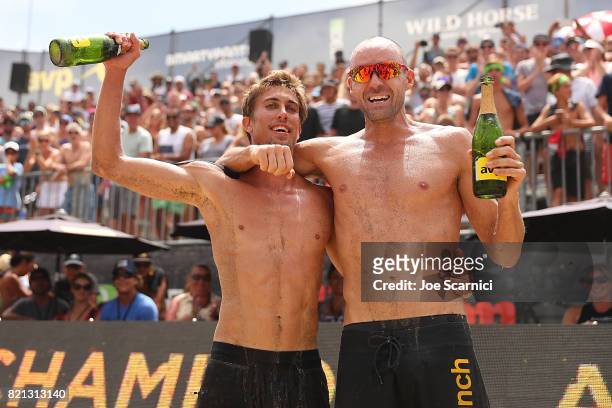 Taylor Crab and Jake Gibb celebrate after winning championship point at the AVP Hermosa Beach Open on July 23, 2017 in Hermosa Beach, California.