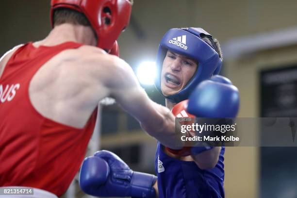 Charles Frankham of England and Luke Clague of Australia compete in the Boy's 60 kg Gold Medal bout between Charles Frankham of England and Luke...