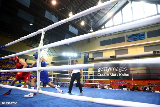 Charles Frankham of England and Luke Clague of Australia compete in the Boy's 60 kg Gold Medal bout between Charles Frankham of England and Luke...