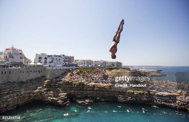 In this handout image provided by Red Bull, Andy Jones of the USA dives from the 27 metre platform during the third stop of the Red Bull Cliff Diving...