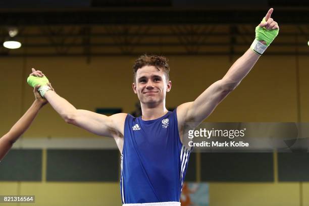 Tyler Jolly of Scotland celebrates victory in the Boy's 64 kg Gold Medal bout between Tyler Jolly of Scotland and Jacob Lovell of Wales on day 6 of...