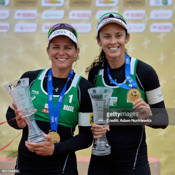 The Warmia Mazury Olsztyn Open gold medal winners Larissa Franca and Talita Antunes of Brazil pose with their medals while awarding ceremony during...