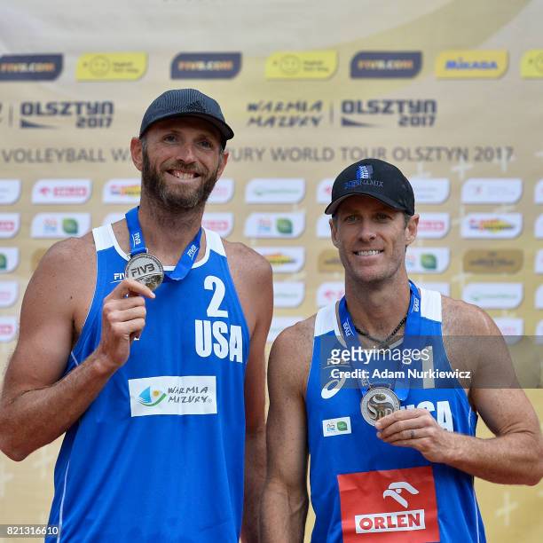 Silver medal winners Ryan Doherty and John Hyden of the U.S. Pose with their medals at the awarding ceremony during FIVB Grand Tour - Olsztyn: Day 5...