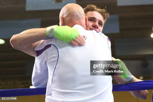 Tyler Jolly of Scotland celebrates victory in the Boy's 64 kg Gold Medal bout between Tyler Jolly of Scotland and Jacob Lovell of Wales on day 6 of...