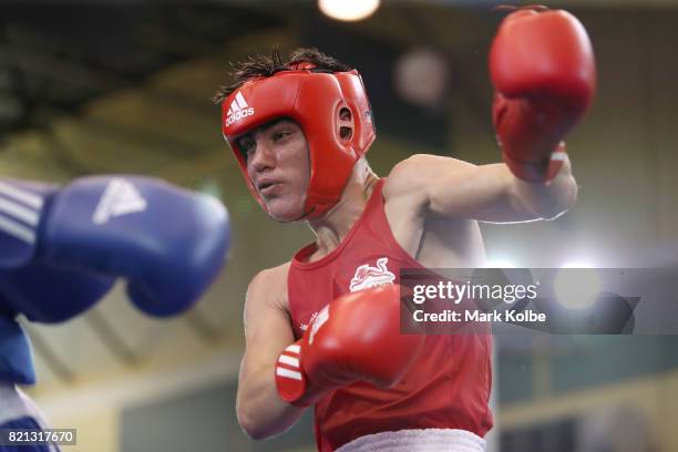 Mark Dickenson of England and Anthony Johnston of Northern Ireland compete in the Boy's 69 kg Gold Medal bout between Mark Dickenson of England and...