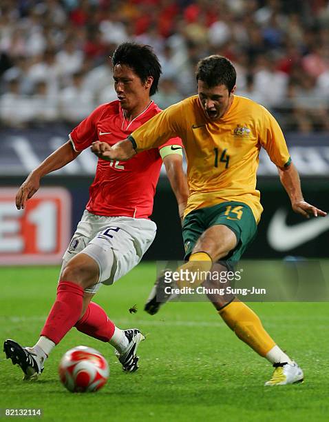 Nikita Rukavytsya of Australia Olyroos and Kim Jin-Kyu of South Korea Olympic team compete for the ball during the international friendly match...