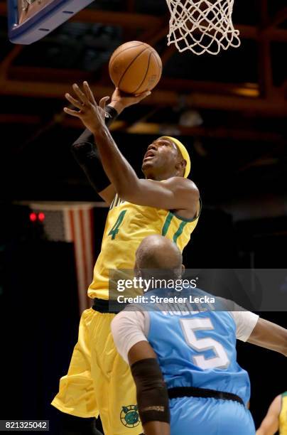 Derrick Byars of the Ball Hogs attempts a shot past Cuttino Mobley of Power during week five of the BIG3 three on three basketball league at UIC...