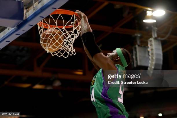 Kwame Brown of the 3 Headed Monsters dunks against 3's Company during week five of the BIG3 three on three basketball league at UIC Pavilion on July...