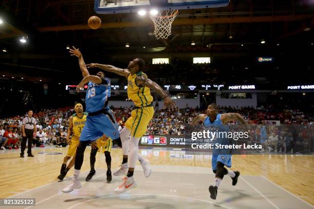 Rasual Butler of the Ball Hogs blocks a shot attempt by Jerome Williams of Power during week five of the BIG3 three on three basketball league at UIC...