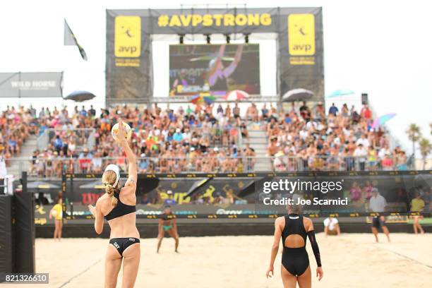 Emily Day serves to Geena Urango and Angela Bensend in the womens final at AVP Hermosa Beach Open on July 23, 2017 in Hermosa Beach, California.