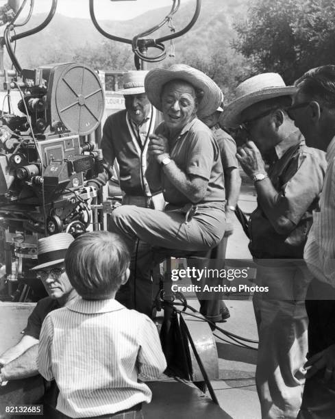 Morton DaCosta directs the film version of the Warner Brothers musical comedy 'The Music Man' , circa 1962.