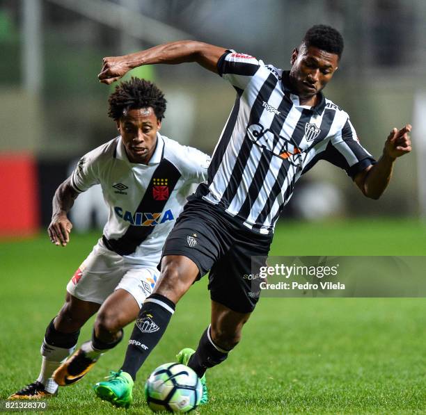 Jesiel of Atletico MG and Paulo Vitor of Vasco da Gama battle for the ball during a match between Atletico MG and Vasco da Gama as part of...