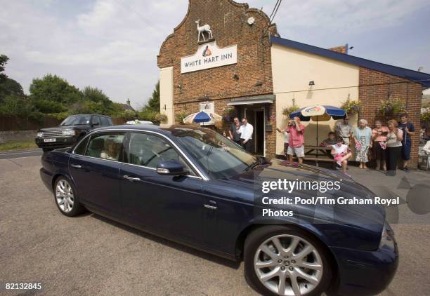 Prince Charles, Prince of Wales and Camilla, Duchess of Cornwall arrive by car at the White Hart in Blythburgh on July 31, 2008 in Suffolk, England.