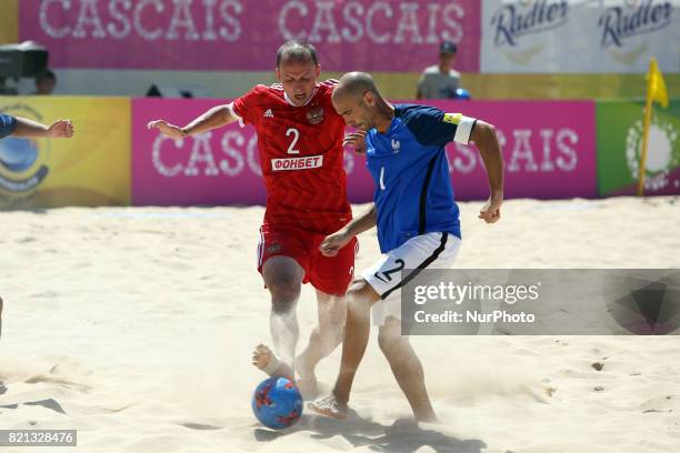 Russia's Kryshanov vies with France's Fischer during the Beach Soccer Mundialito 2017 match between Russia and France at the Carcavelos beach in...