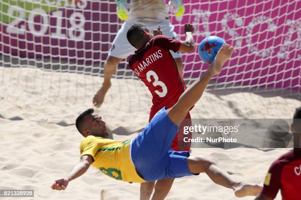 Brazil's midfielder Bruno Xavier kicks the ball during the Beach Soccer Mundialito 2017 match between Portugal and Brazil at the Carcavelos beach in...