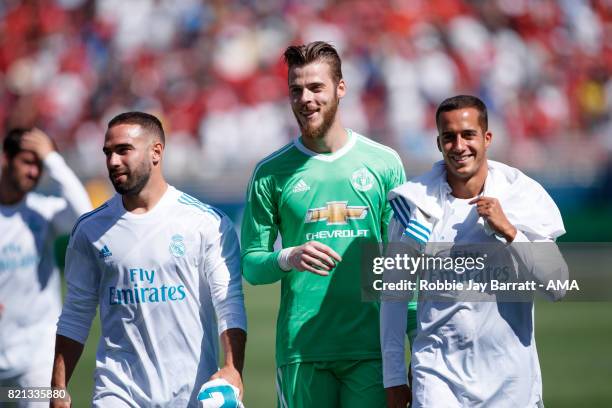 David de Gea of Manchester United walks off with Dani Carvajal of Real Madrid and Lucas Vazquez at full time during the International Champions Cup...