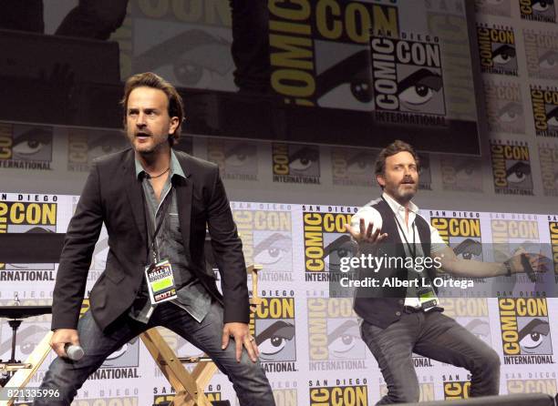 Actors Richard Speight Jr. And Rob Benedict perform onstage at the "Supernatural" panel during Comic-Con International 2017 at San Diego Convention...