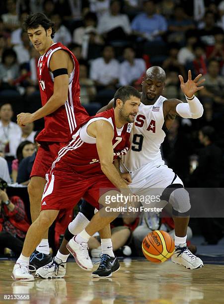 Dwyane Wade the USA Basketball Men's Senior National Team attempts to block Semih Erden of the Turkey National Team during the USA Basketball...