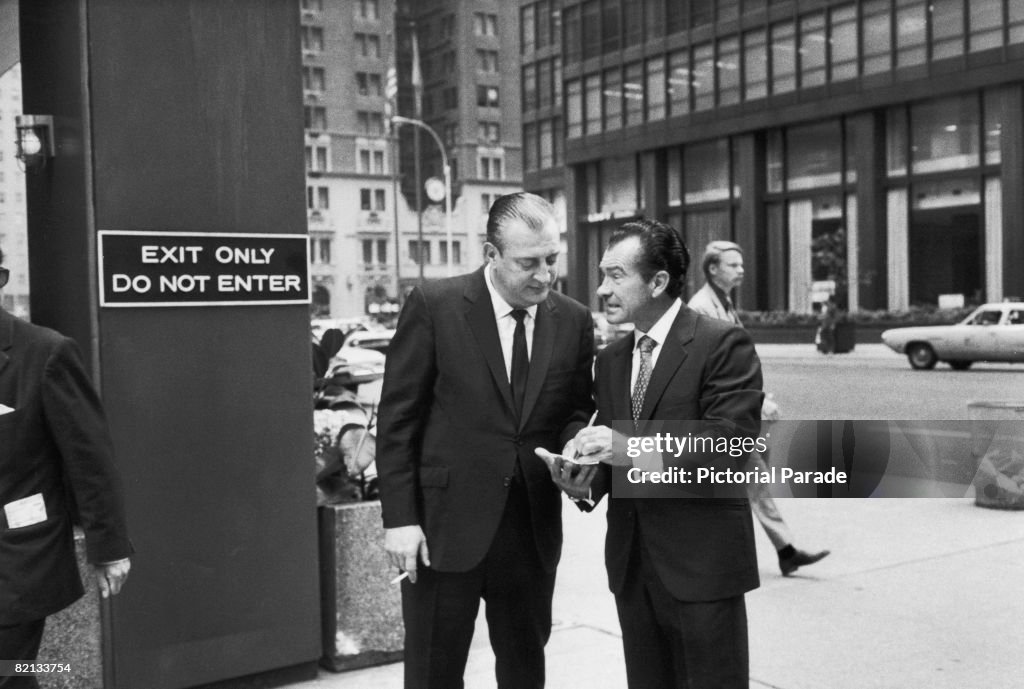 James La Roe Richard Nixon look-alike James LaRoe signs an autograph for American ...