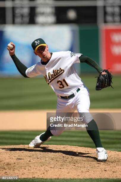Brad Ziegler of the Oakland Athletics pitches during the game against the Kansas City Royals at the McAfee Coliseum in Oakland, California on July...