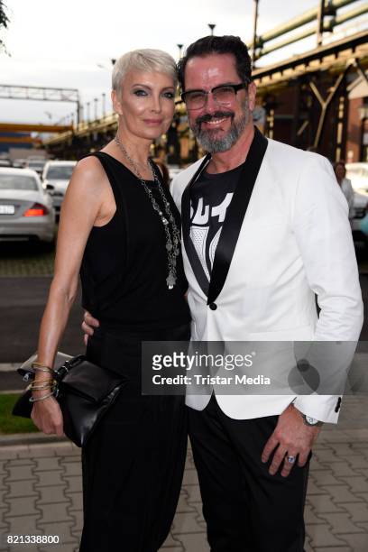 Alex Jolig and his wife Britt Jolig-Heinz attend the Thomas Rath show during Platform Fashion July 2017 at Areal Boehler on July 23, 2017 in...