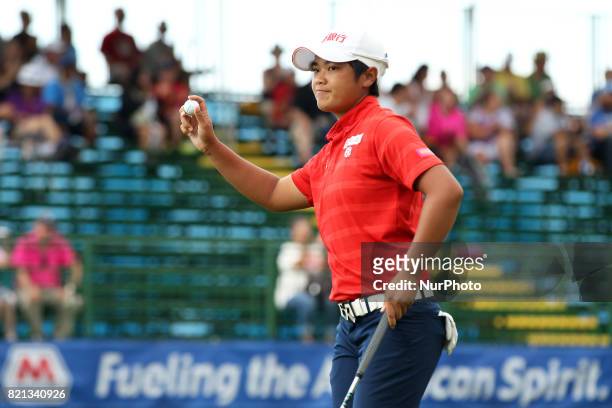 Peiyun Chien of Chinese Taipei acknowledges the gallery on the 18th green during the final round of the Marathon LPGA Classic golf tournament at...